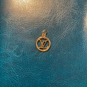 Gold Tone Logo Charm